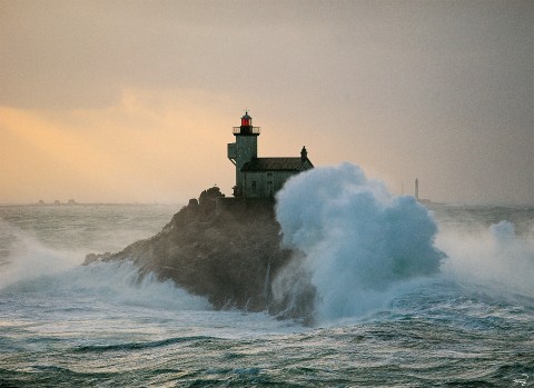 Photo The Tévennec lighthouse at the tip of Finistère, Brittany par Philip Plisson