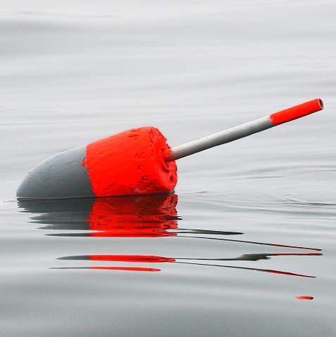 Photo Trio bouées de casiers de pêche par Philip Plisson