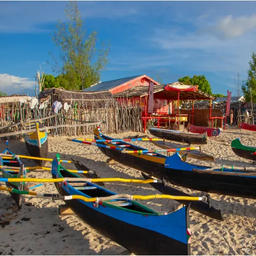 Colourful pirogues on the beach